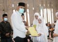 Bupati Sijunjung Hadiri Aqiqah dan Khatam Al-Qur’an di Nagari Kandang Baru
