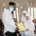 Bupati Sijunjung Hadiri Aqiqah dan Khatam Al-Qur’an di Nagari Kandang Baru